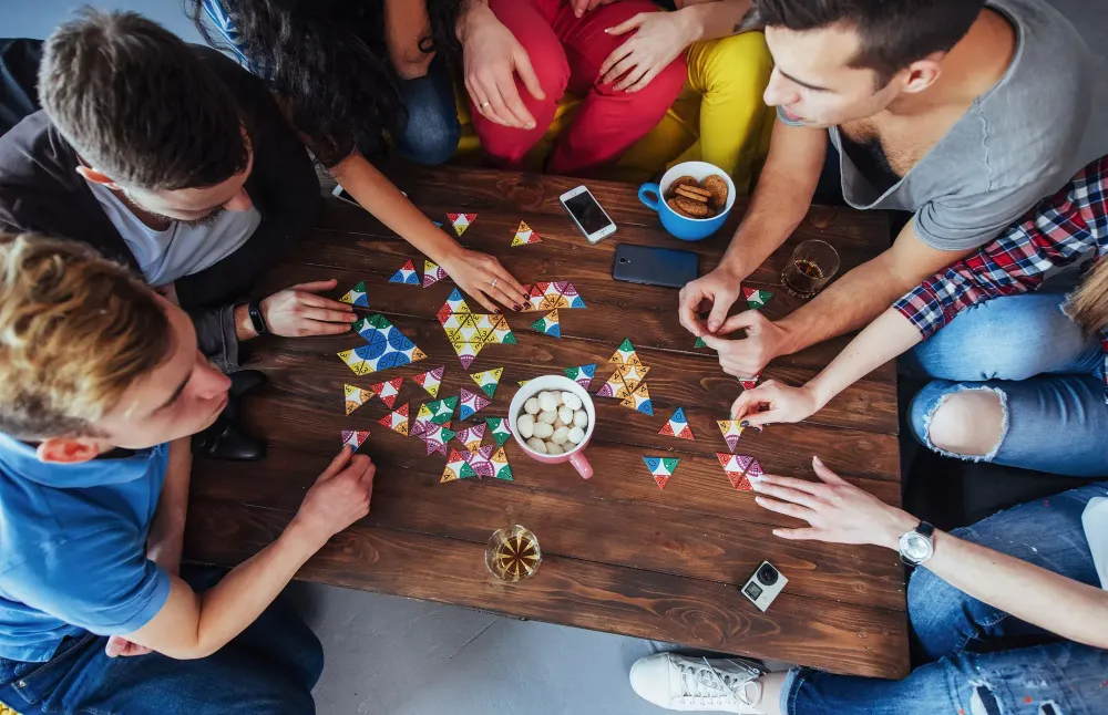 Friends playing a board game